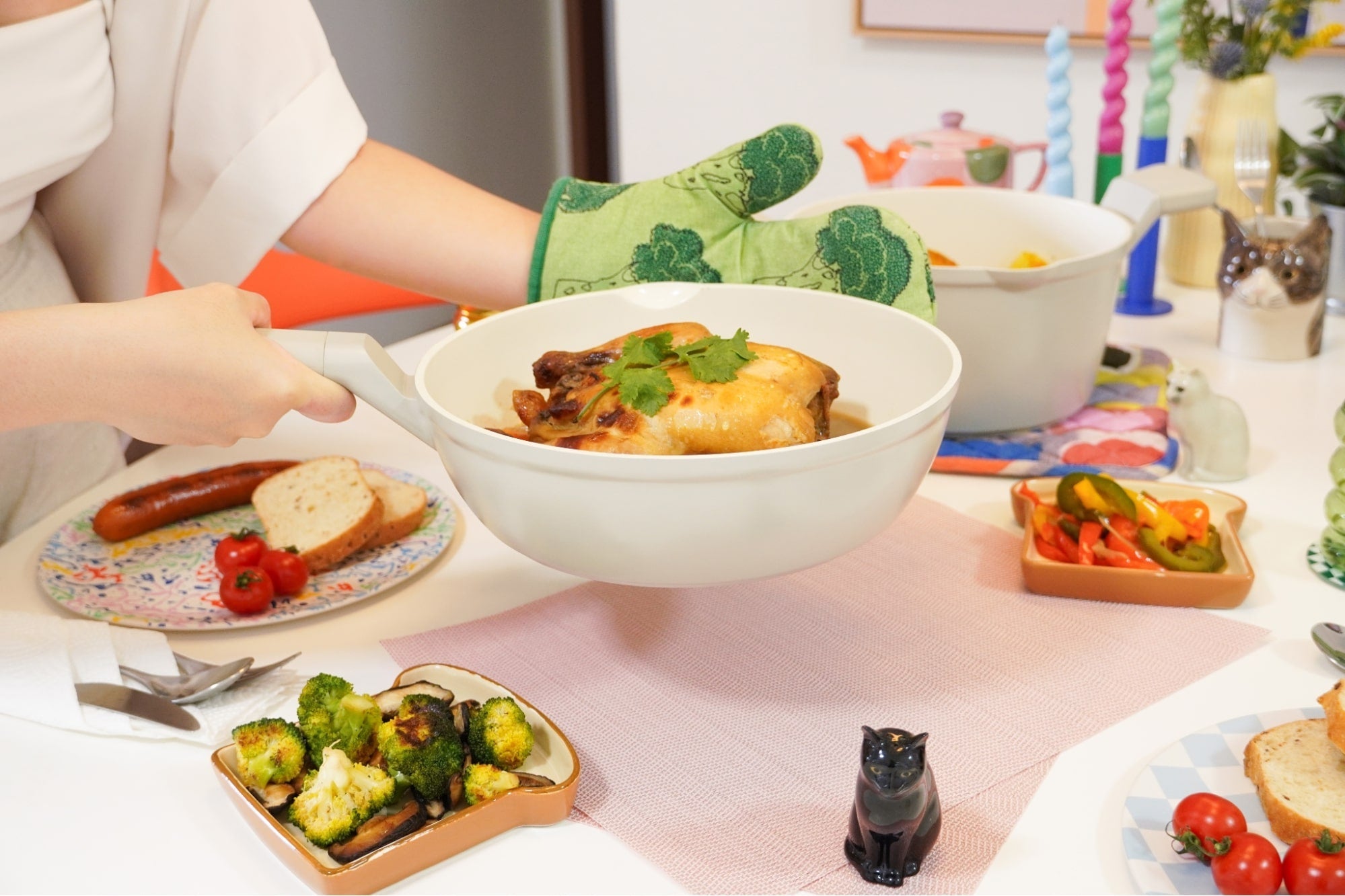 Serving of food in a pan to the dinner table