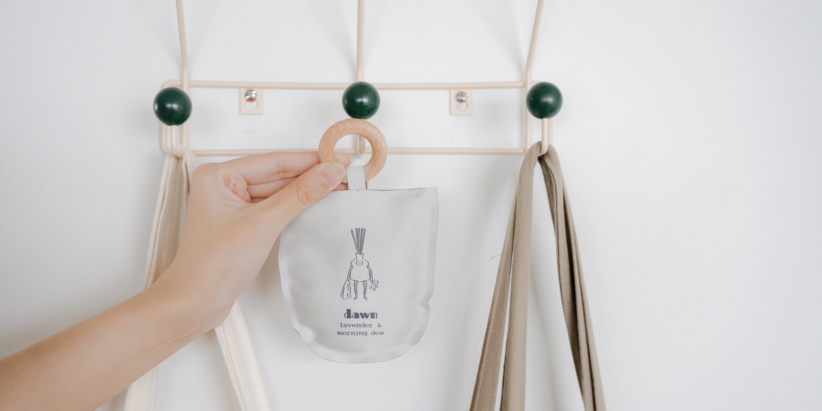 hand hanging scented sachet on clothes rack