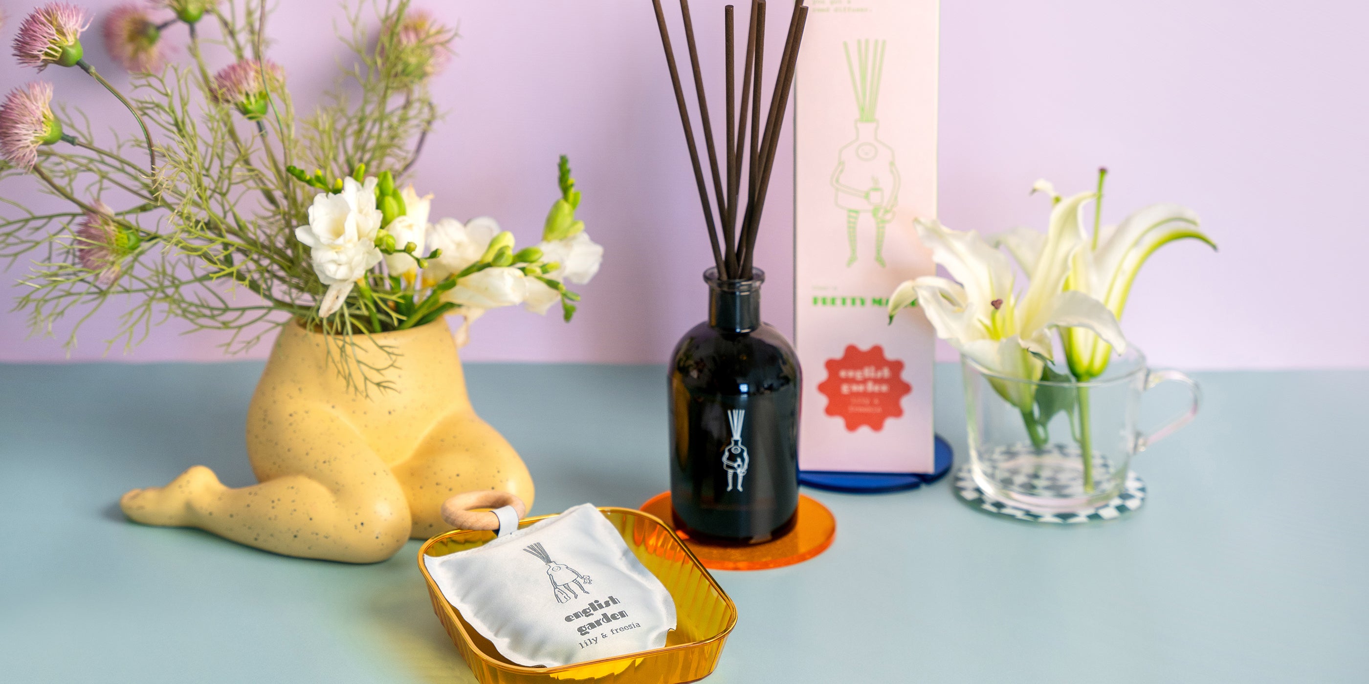 pretty major home fragrance reed diffuser and scented sachet with lily and freesia scent